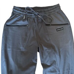 Scrubs Grey Jogger Sz Small. 
14” waist with an extra 3” of stretch
Martha Mabel